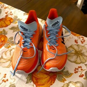 Hoka shoe . Mach5 . Color orange .